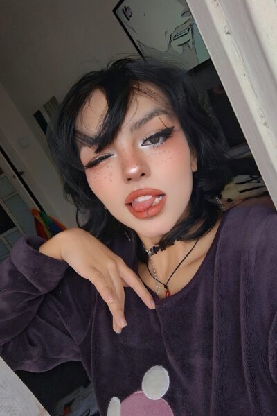 Cute brunette teen Nerdy B changes her clothing while taking non-nude selfies